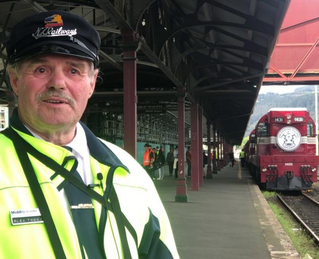 Rail enthusiast Alex Toon, with the train at Dunedin Railway Station yesterday. Photo: Jamie Morris