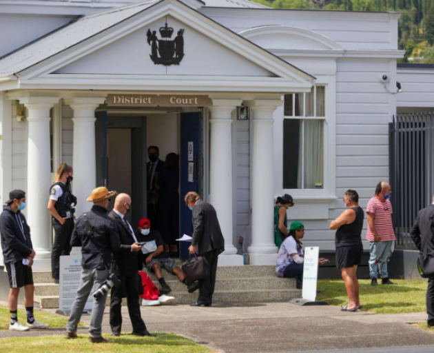 People waited outside Te Kuiti District Court in January last year for Tom Phillips to appear but...