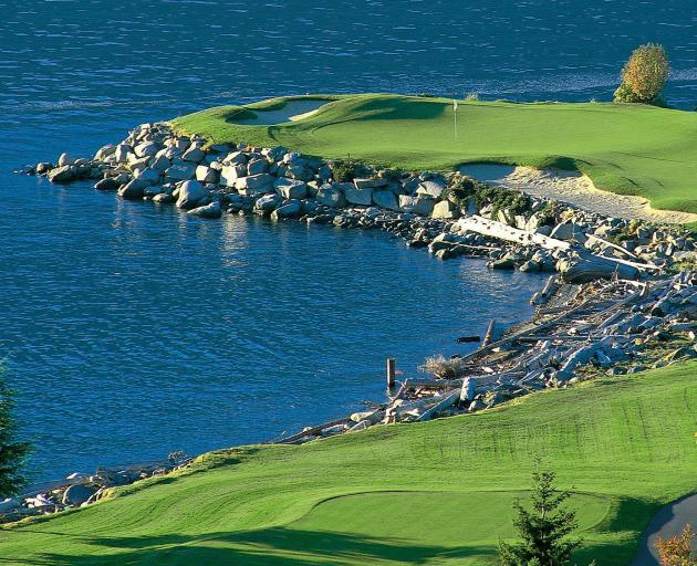 Take on the signature hole — the peninsula 14th green at spectacular Furry Creek.  PHOTO: GOLF BC...