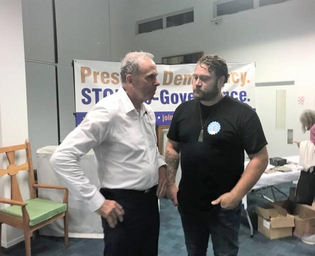 Julian Batchelor and anti-vax activist Brad Flutey. PHOTO: DAVID FISHER