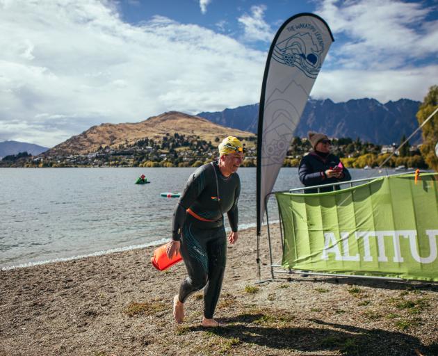 5km swimmer Belinda Mitchell darts up the finish chute, completing the Haki-te-kura Crossing...