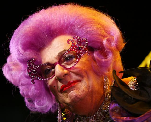 Australian comedian, actor and author Barry Humphries, dressed as his alter ego, Dame Edna...