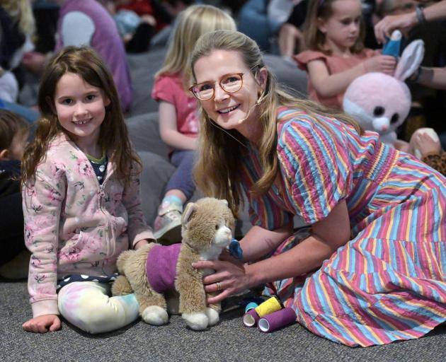 Children’s entertainer Suzy Cato helps Evelyn Thorsen (6), of Dunedin, bandage her soft toy at...