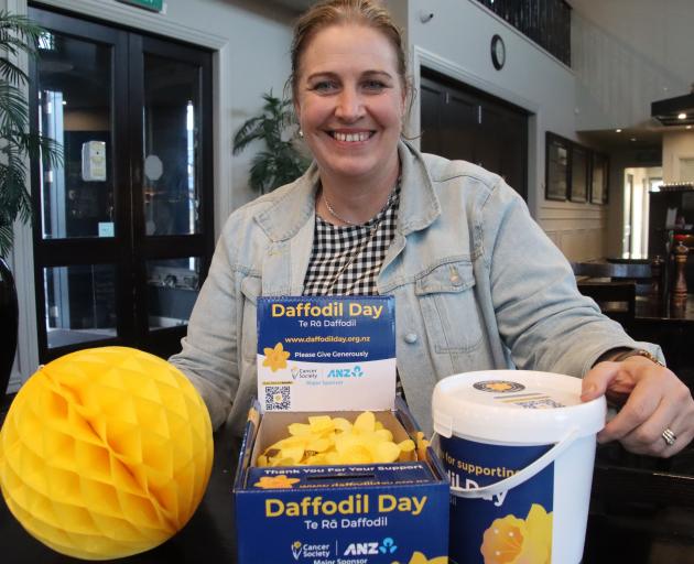 Gore Daffodil Day co-ordinator Sandy Smith is encouraging people to give generously on Friday...