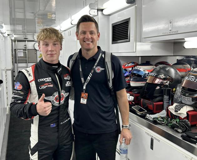 Jacob Douglas caught with karting coach Matt Hamilton at a recent round. Photo: Supplied