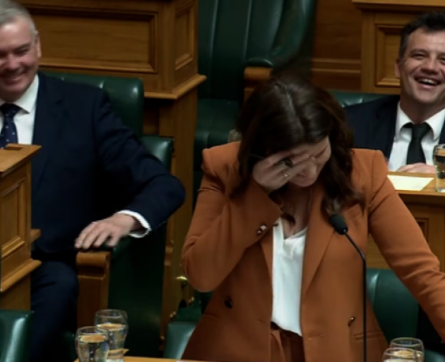 National Party finance spokeswoman Nicola Willis laughing in Parliament after making a faux pas...