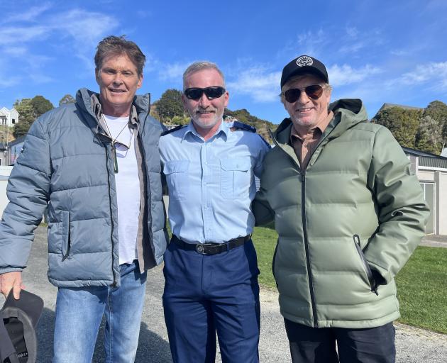 Television star David Hasselhoff (left) and New Zealand comedian Rhys Darby flank sole Stewart...