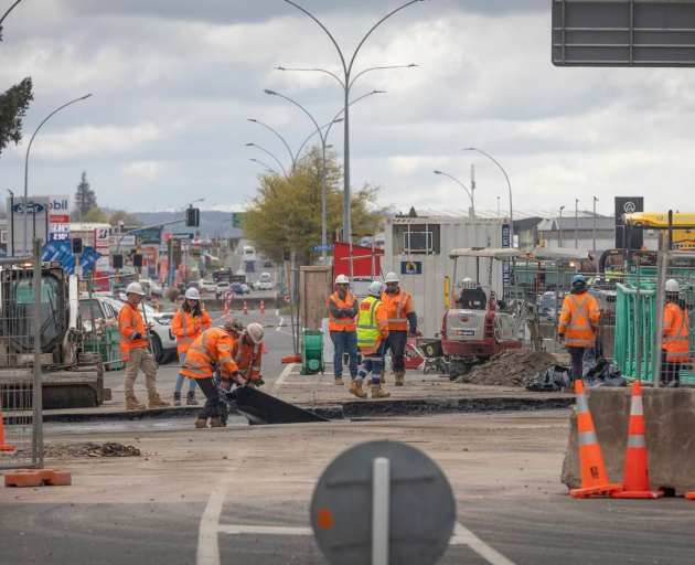 Roadworkers on Utuhina bridge. Photo / Andrew Warner