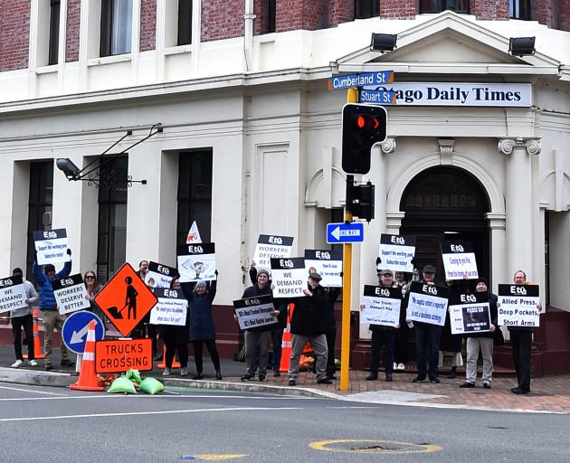 Journalists outside Allied Press's Dunedin office.