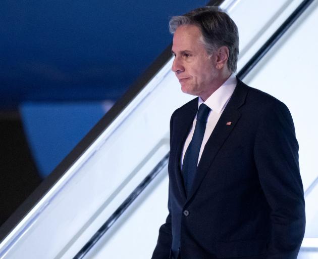 US Secretary of State Antony Blinken disembarks from his airplane upon arrival at Ben Gurion...