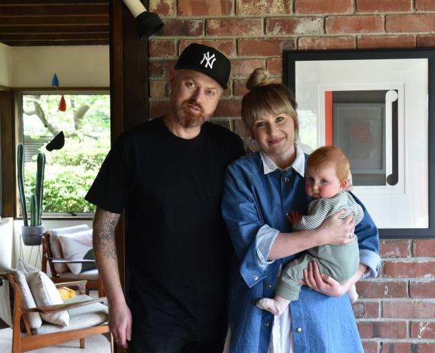 Julia Hutchinson, pictured with husband Jay and their eight-month-old daughter, Alwyn, says she...