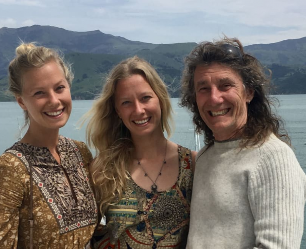 Andrew Milne with his twin daughters Alice and Sorrel O'Connell-Milne. Photo: Supplied