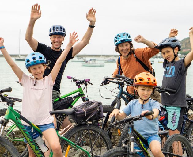 Celebrating reaching the end of the Alps2Ocean track at Oamaru Harbour yesterday are the McCann...