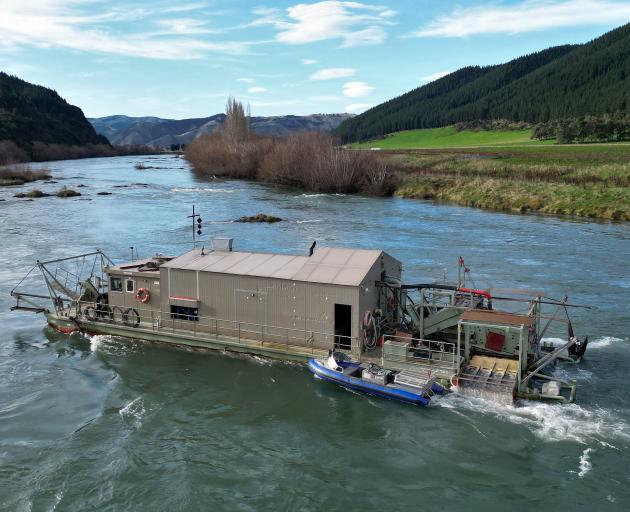 A dredge owned by Cold Gold Clutha Ltd works the Clutha River about 5km south of Beaumont. PHOTO:...