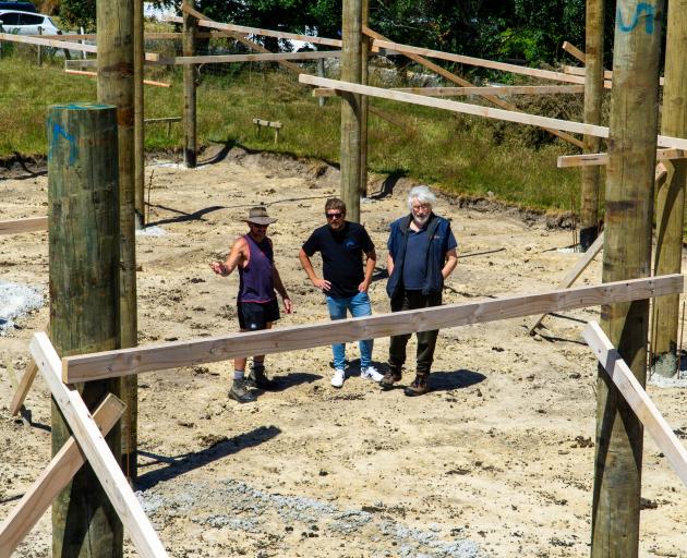 Looking at progress on the site of the new community workshop are (from left) Hampden Community...