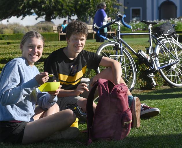 Dunedin residents Bailee Ryan and Cameron Metherell enjoy a bowl of muesli and a coffee yesterday...