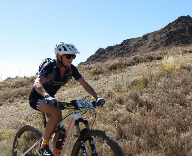Mountainbiker Lisa McMillan sets off on the Prologue stage of the Prospector race, held near...