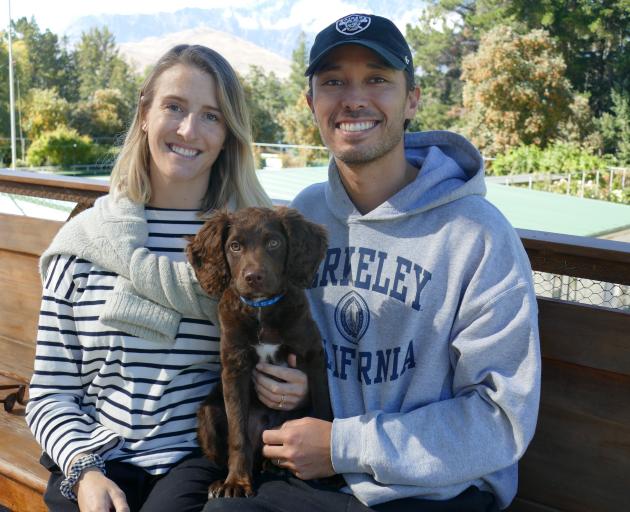 Newly-retired tennis pro Ben McLachlan with his wife Georgia and their new puppy, Milo. PHOTO:...