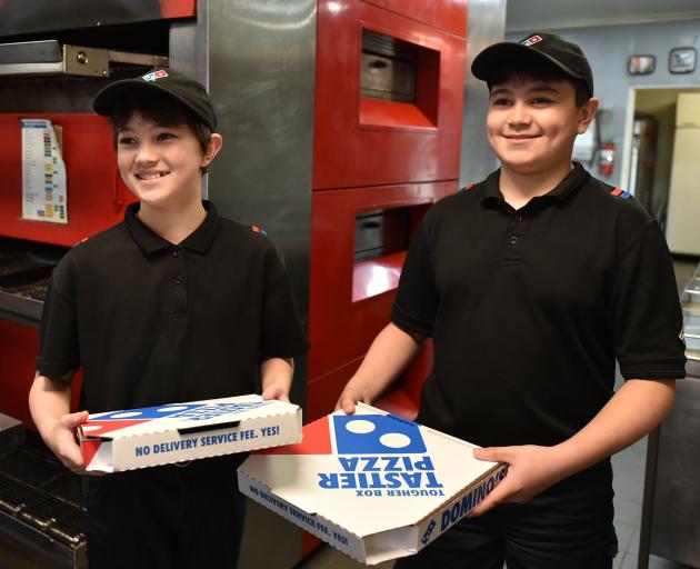 Domino’s youngest employees Zach, 11, (left) and Alex Riach, 14, will not be working the Saturday...