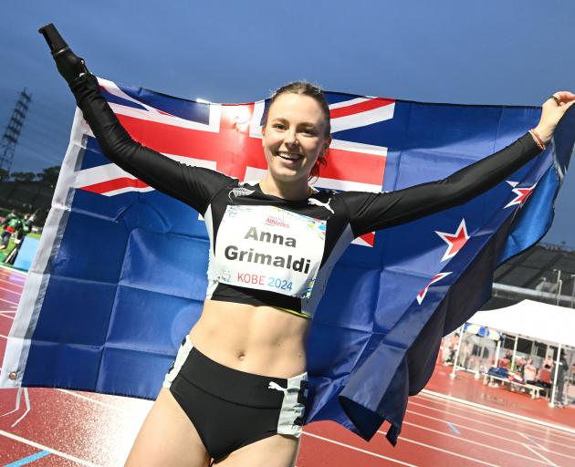 Anna Grimaldi celebrates after winning bronze at the World Para Athletics Championships in Kobe....