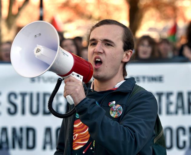 Neave Ashton leading the protest to the clocktower.  PHOTO: GREGOR RICHARDSON