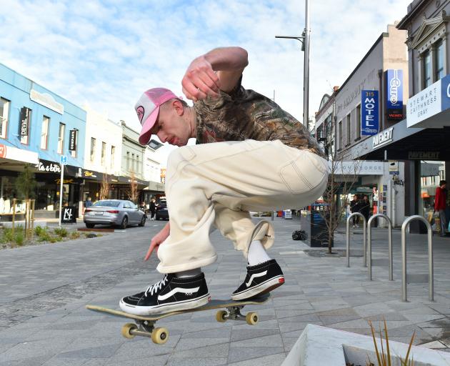 Dunedin skater Harry Dolan shreds a new ledge in George St outside skating and clothing store...