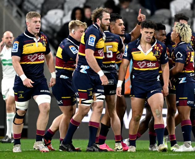 Tanielu Tele'a celebrates after scoring a try. Photo: Getty Images