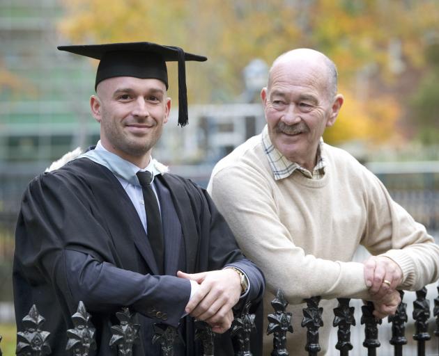 University of Otago law graduand James Inder with his father Craig, who also graduated from Otago...