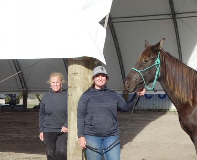 Deb Smith, her daughter Claire and horse Hennessy are excited for their new equestrian arena to...