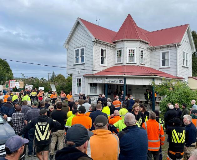 Miners and protesters wait for the meeting to start in Blackball yesterday. PHOTO: GREYMOUTH STAR
