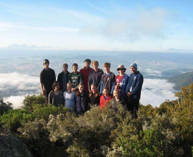 Dunedin teenager Isabel Sheehan (front row, third from left) is pictured with fellow members of ...