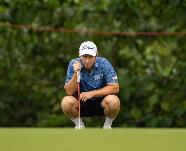 Ben Campbell lines up a putt during the final round of the International Series Macau earlier...