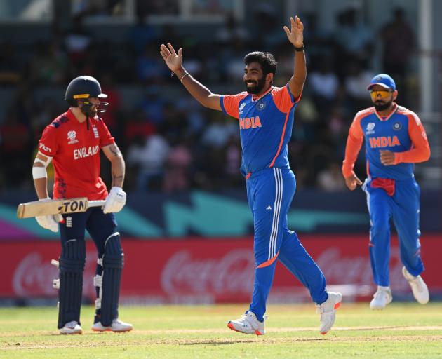 India's Jasprit Bumrah celebrates a wicket during his side's demolition of England in the second...