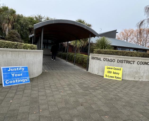 Placards greeted councillors as they arrived for the vote on the annual plan this morning in...
