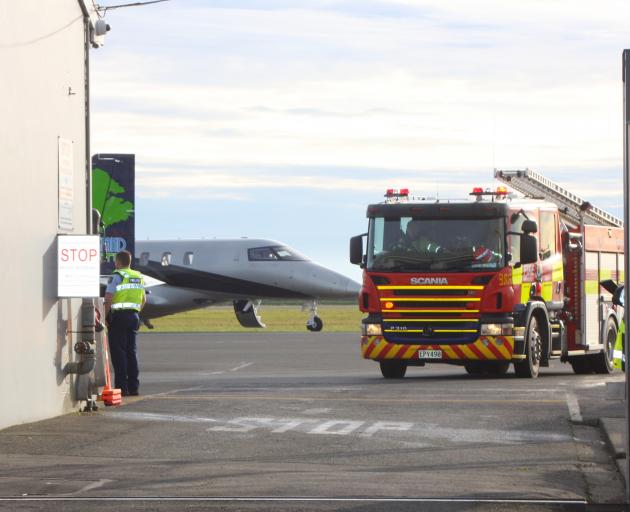 Emergency services welcome a private jet at Invercargill Airport this morning. Photo Toni McDonald 
