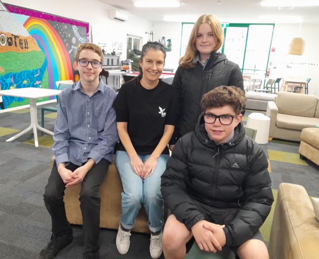 Kahu Youth operations manager Anna Sutherland, centre, with some of the young people volunteering...