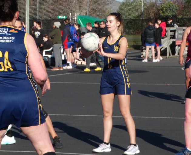 Valley Karaka centre Brylee More feeds the ball into her shooters. PHOTOS: NIC DUFF