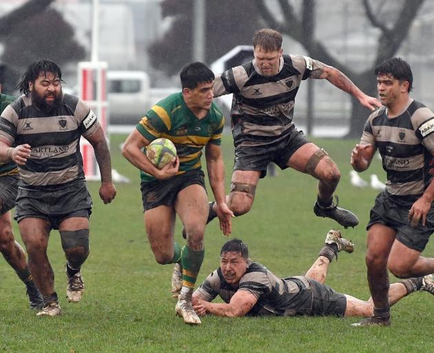 Green Island winger Levi Harmon charges up field during a Dunedin premier club game against...