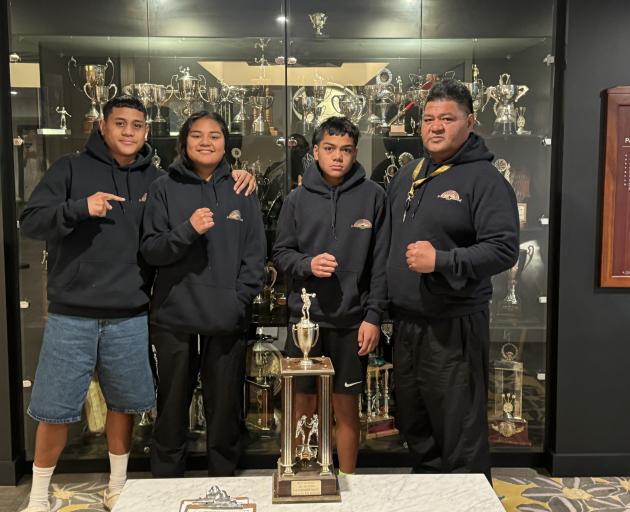 Celebrating their success at the South Island Golden Gloves tournament are (from left) Pasoni...