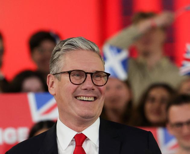 Keir Starmer, leader of Britain's Labour party, reacts as he addresses his supporters at a...