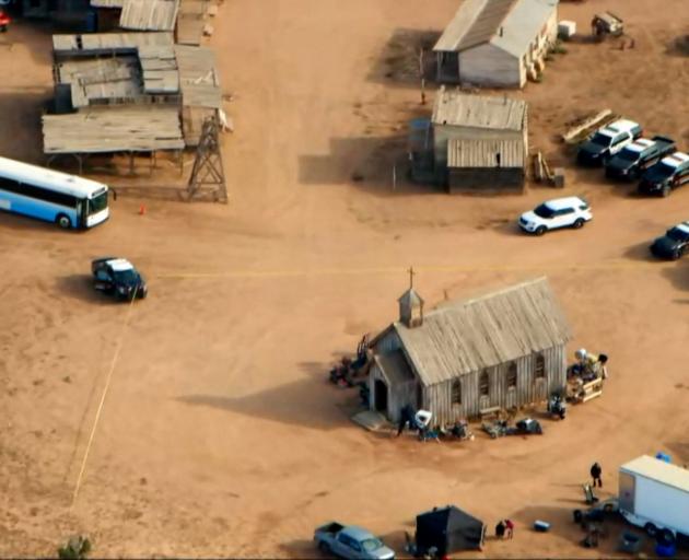 The shooting happened at a movie-set church about 30km southwest of Santa Fe in New Mexico. Photo...
