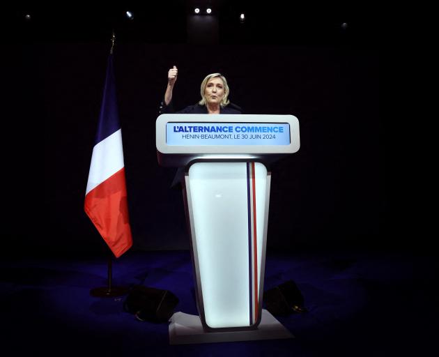 Marine Le Pen speaks after the first round of French election results were announced. Photo:...
