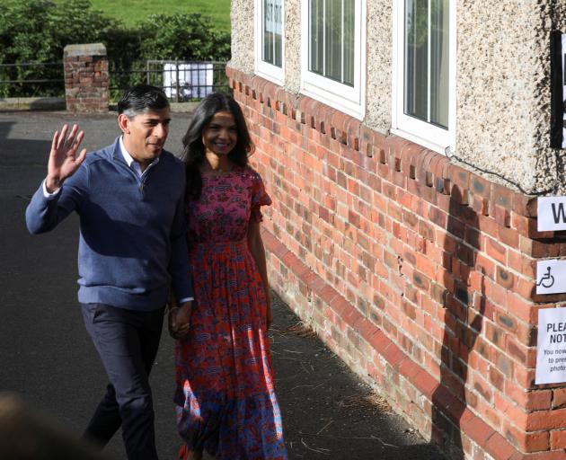 Prime Minister Rishi Sunak and his wife Akshata Murty outside a polling station in Northallerton....