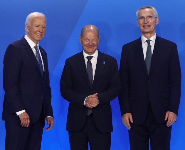 US President Joe Biden (left), German Chancellor Olaf Scholz  and NATO Secretary General Jens...