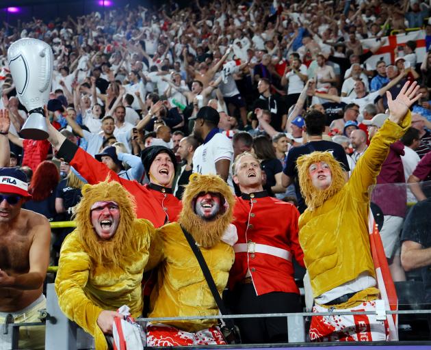 England fans celebrate their side's late winner in Dortmund. Photo: Reuters 