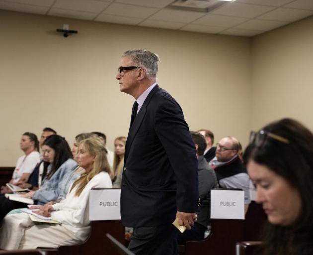 Alec Baldwin enters court during his involuntary manslaughter trial in New Mexico. Photo: Pool...