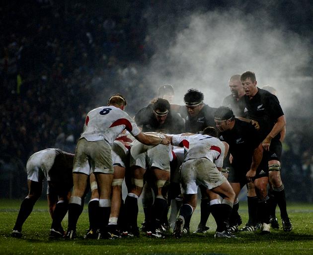 The All Blacks and England get ready to pack down a scrum at Carisbrook in 2004. PHOTO: PETER...