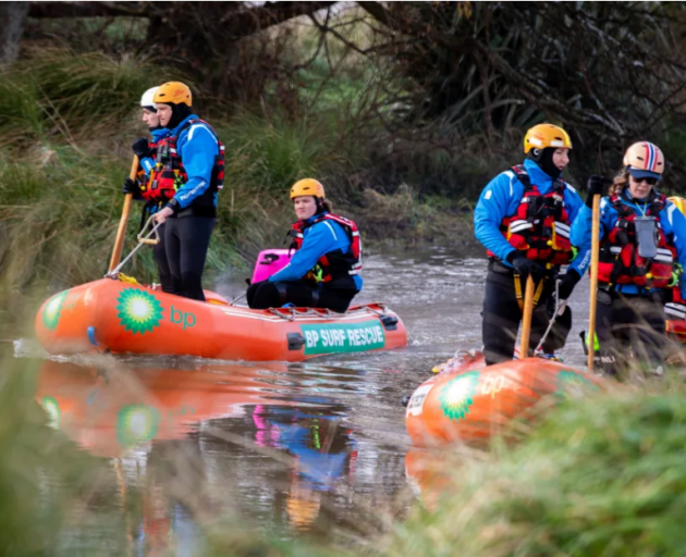 Police search the Halswell River in the Christchurch suburb of Greenpark after Yanfei Bao's...