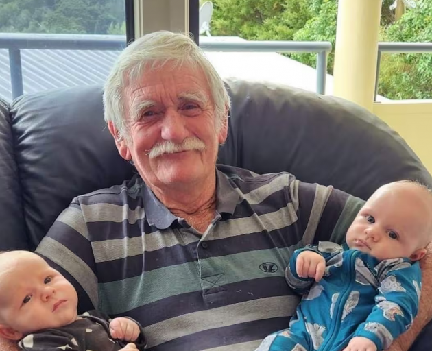 Russell ferry owner and skipper Bill Elliott with two of his grandchildren. Photo: Supplied