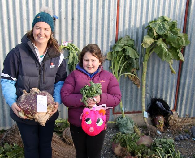 Kirsten McIntyre, Hannah Donovan, 8, and "Pinkie" among the whopper swede entries.